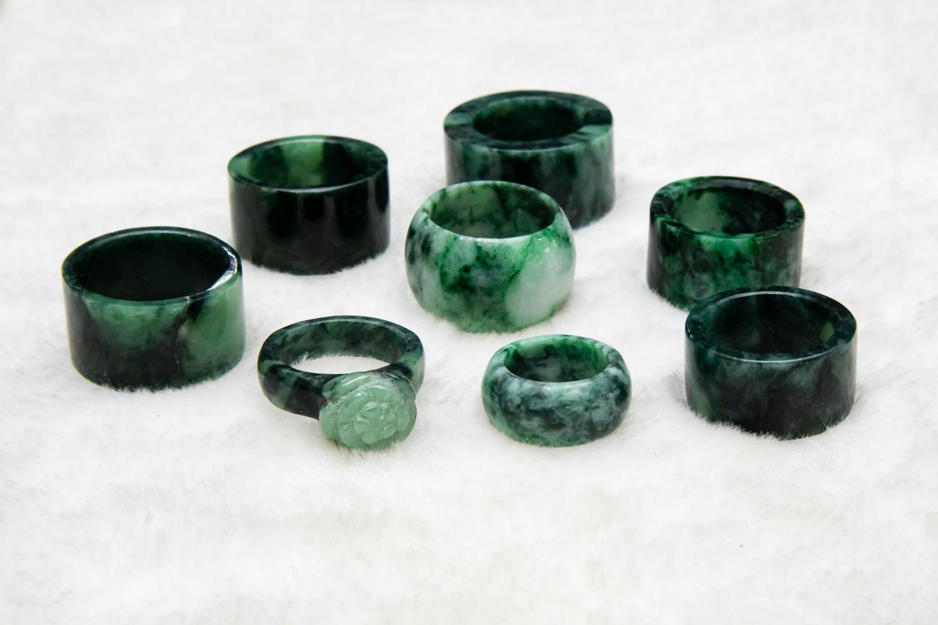 a close up shot of jade rings